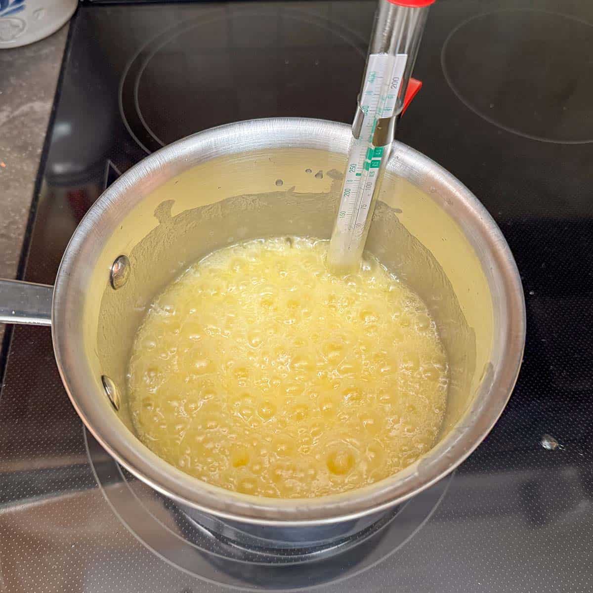 The start of the boiling of the toffee in a 2 qt saucepan.