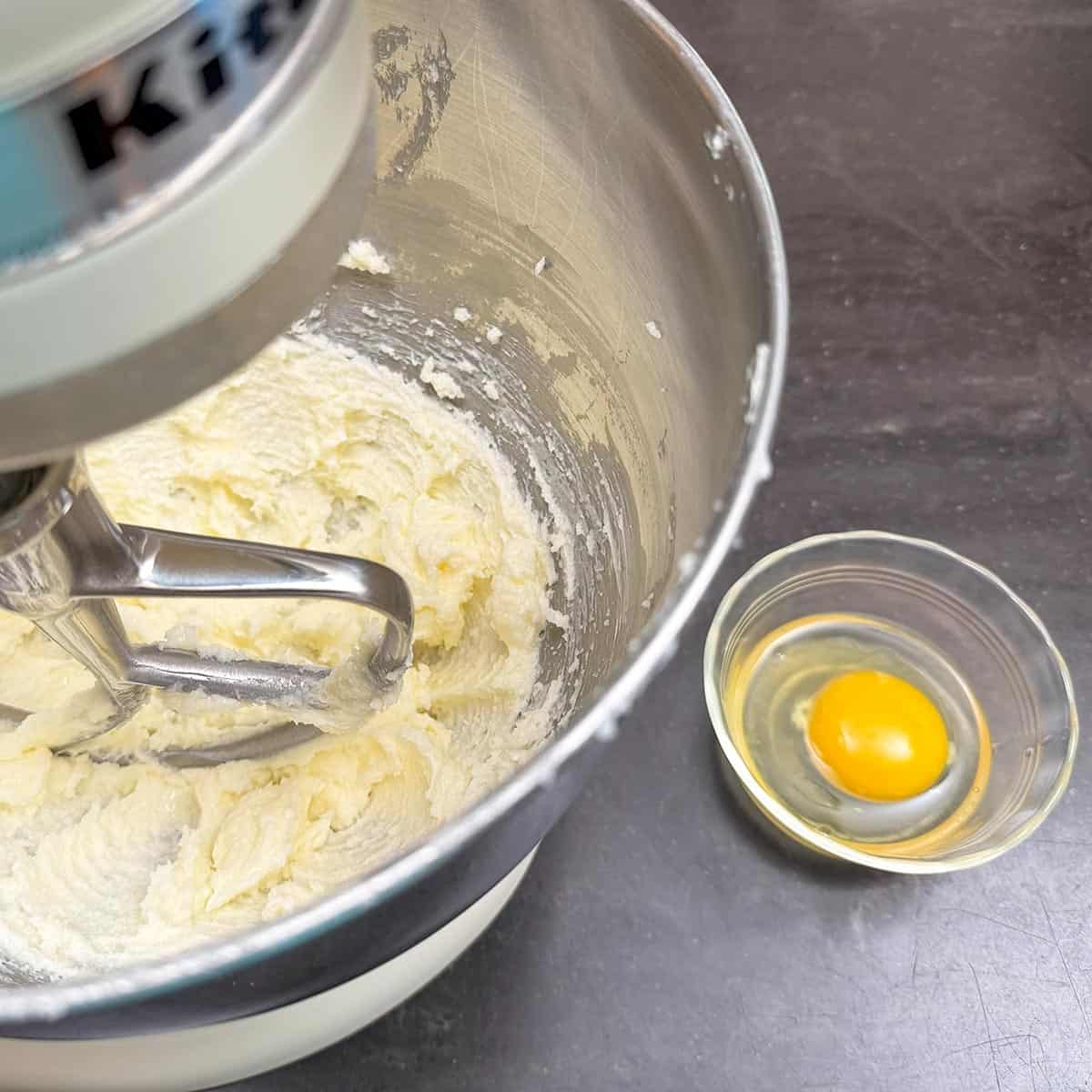Crack egg in small container so you do not get any shell in the cookie dough.
