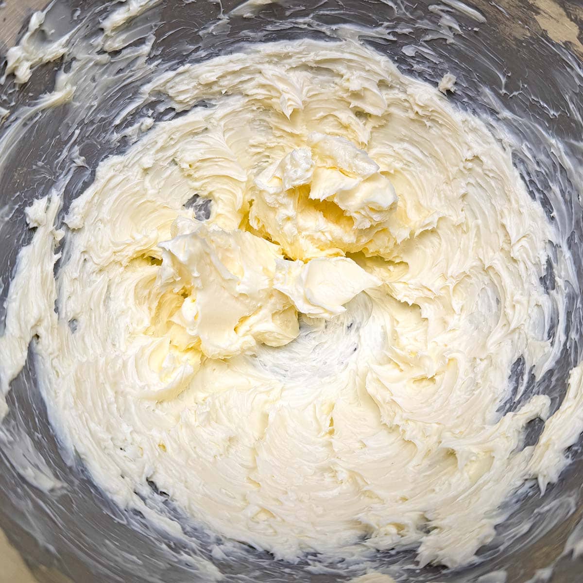 In a mixer bowl creamed butter.