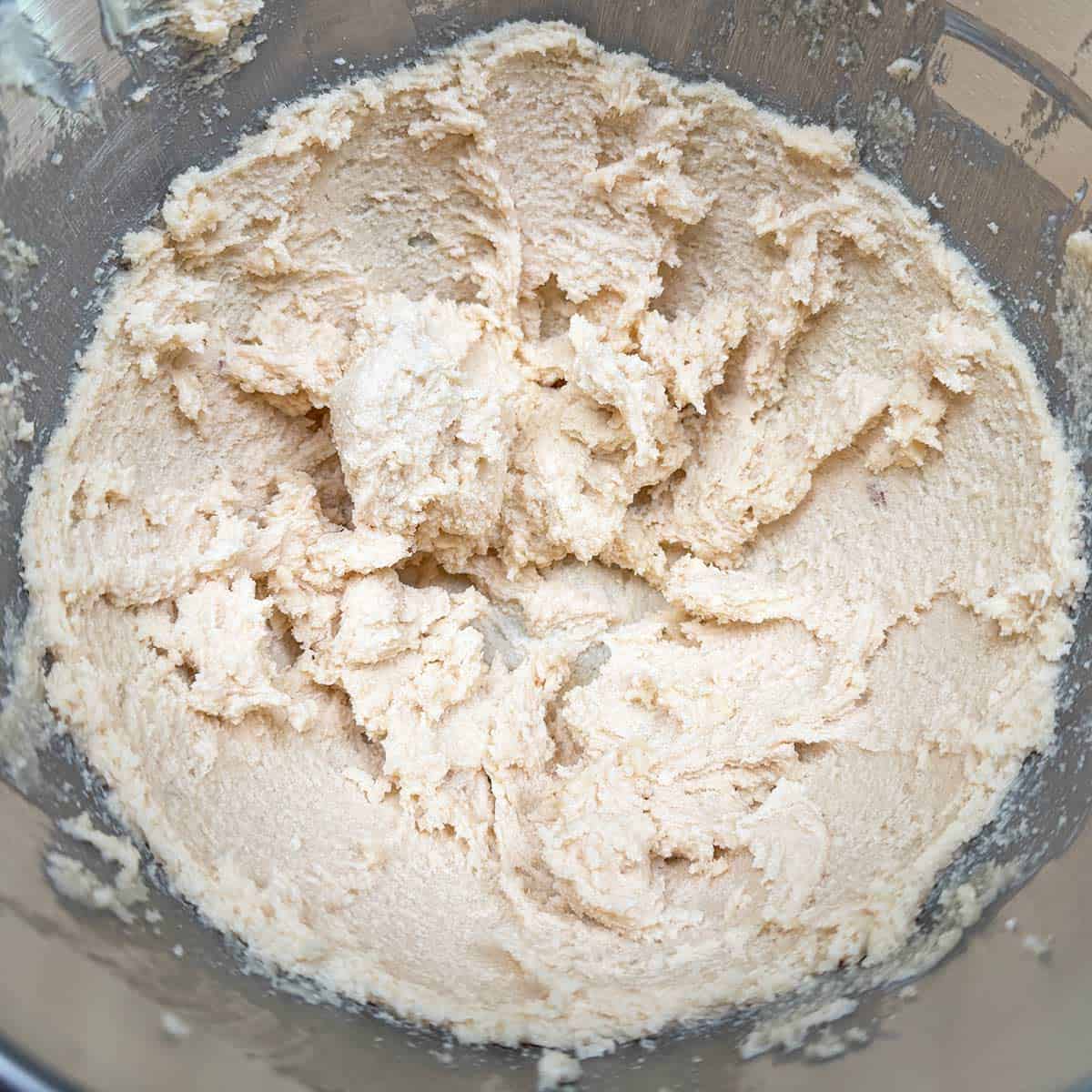 Sugar added to the creamed butter and mixed for 3 minutes.