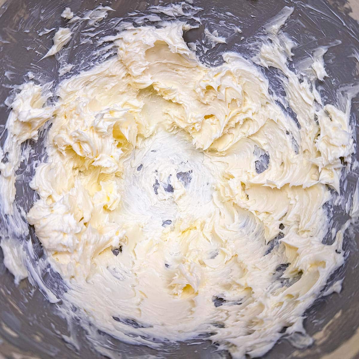 Cubed butter that has been creamed and have soft peaks.