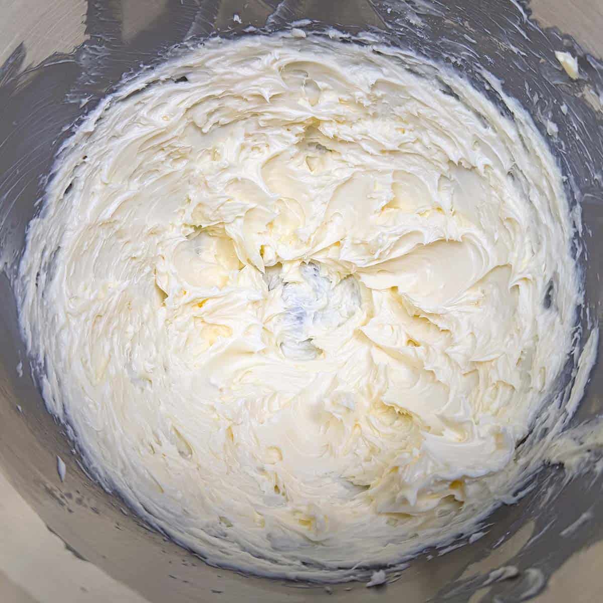 Creamed butter that has been mixed with the powdered sugar.