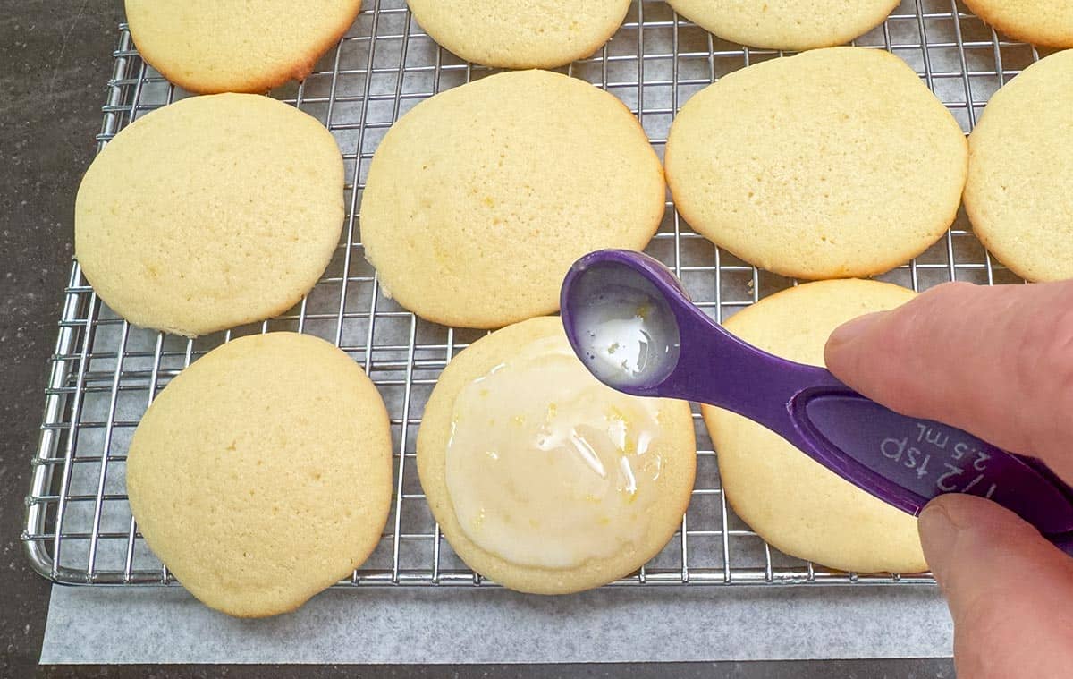 Using a ½ teaspoon of glaze for each cookie, then spreading it around the top of the cookie.