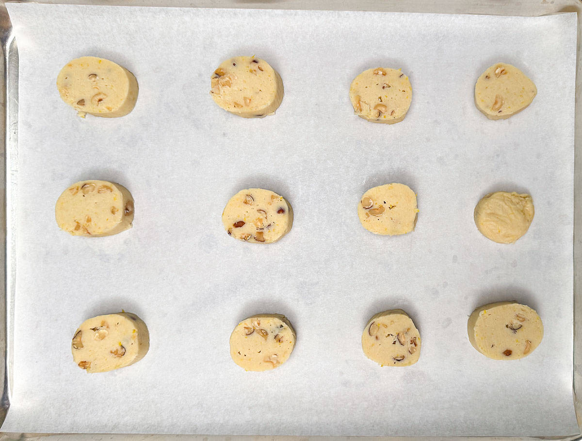 Slice cookies on a parchment lined cookie sheet pan.