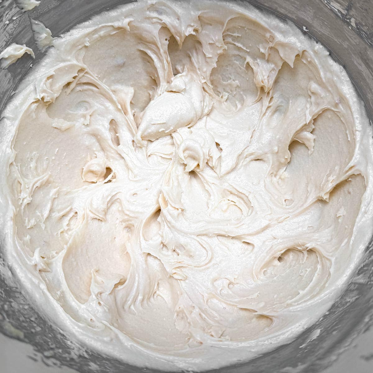 After mixing the brown sugar into the creamed butter and cream cheese.