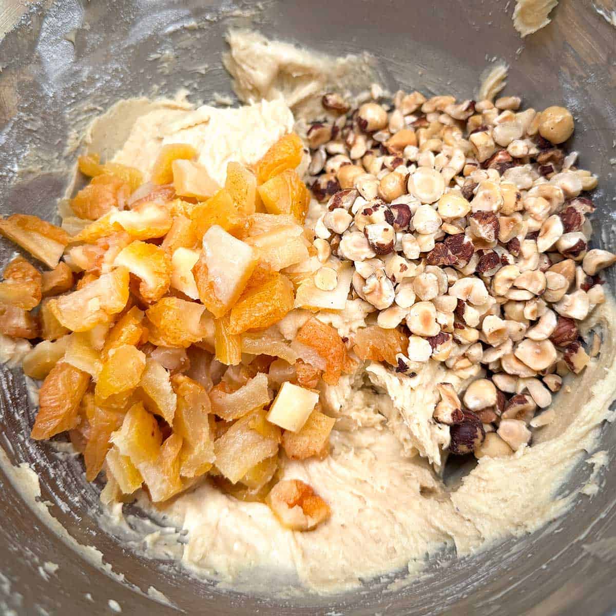 Last thing to add to the cookie dough - dried cutup pears and chopped hazelnuts.