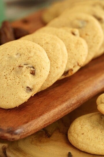 Vintage spiced date cookies on wooden boards.