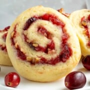 Apple Cranberry Walnut Swirl Cookies front view showing the swirls and whole cranberries. .