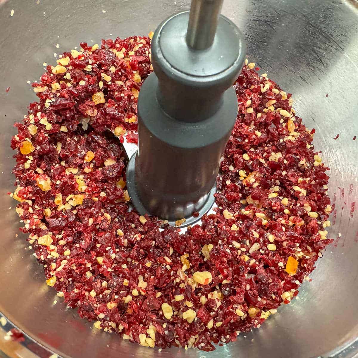 Added orange peel and minced once more in the cranberry-walnut mixture.