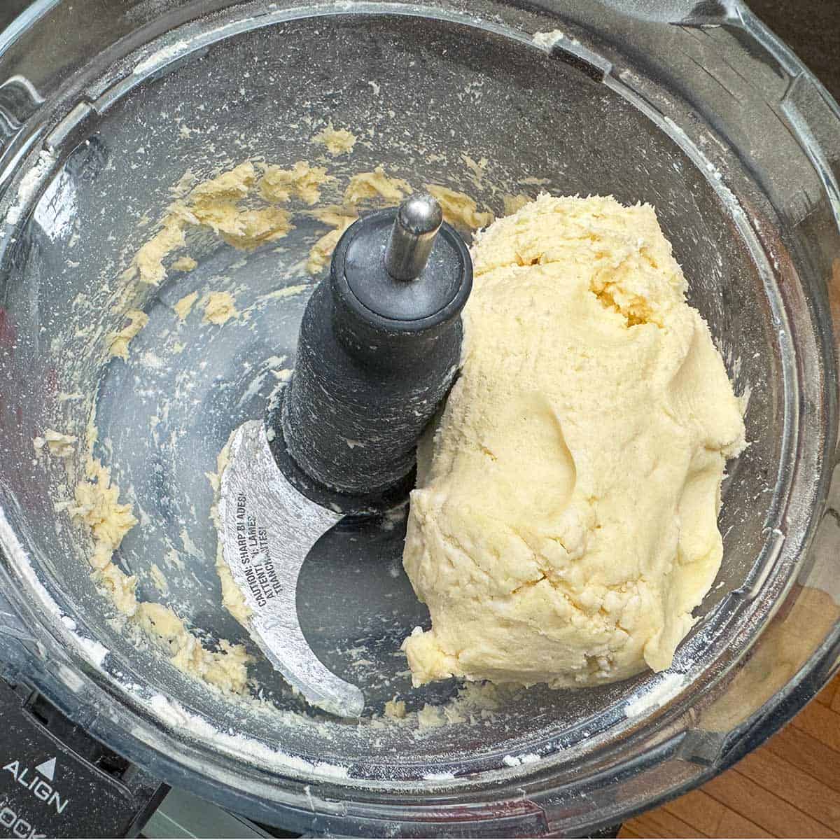 Cookie dough mixed in the food processor into a ball.