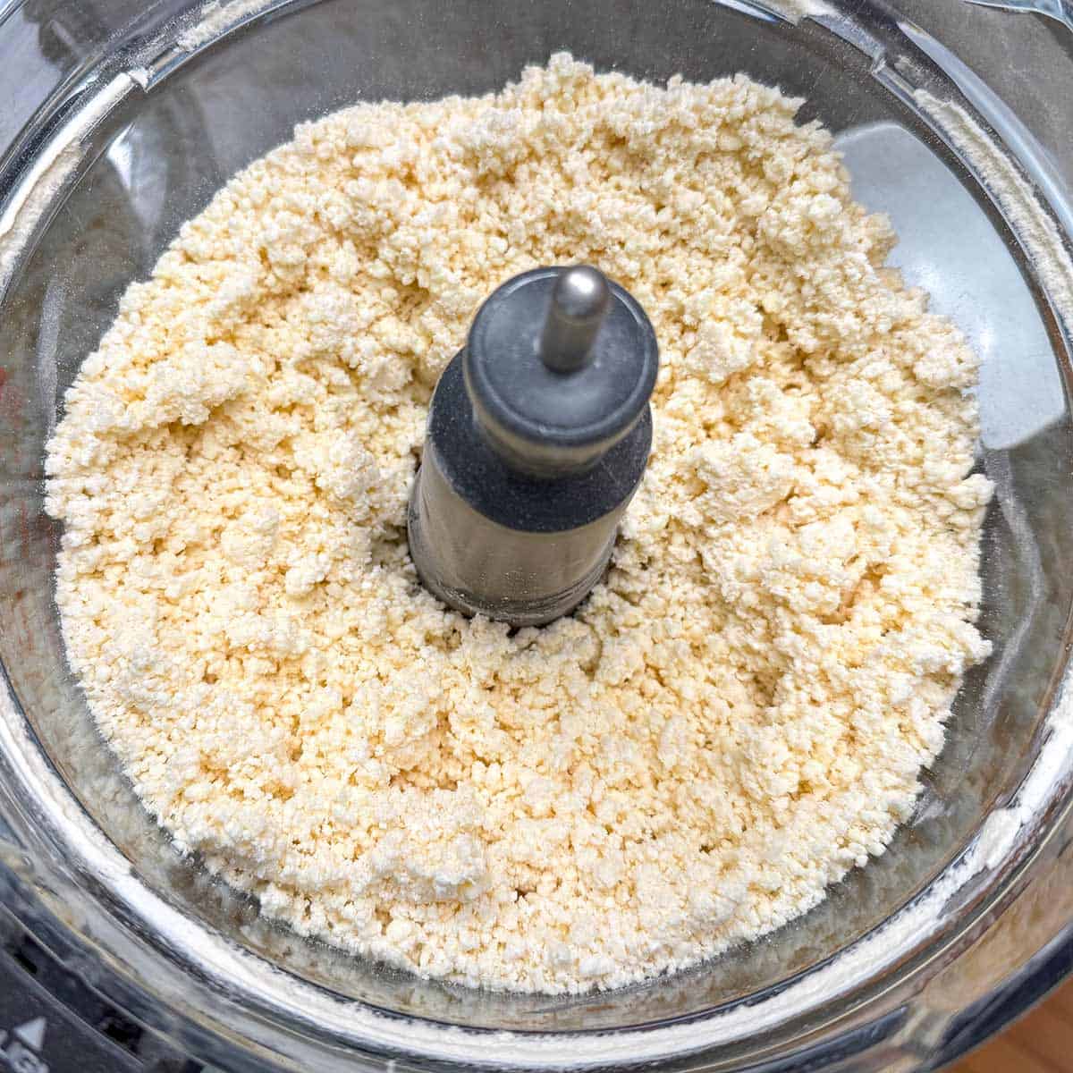 Cream cheese and butter mixed with the flour mixture to form small little balls.