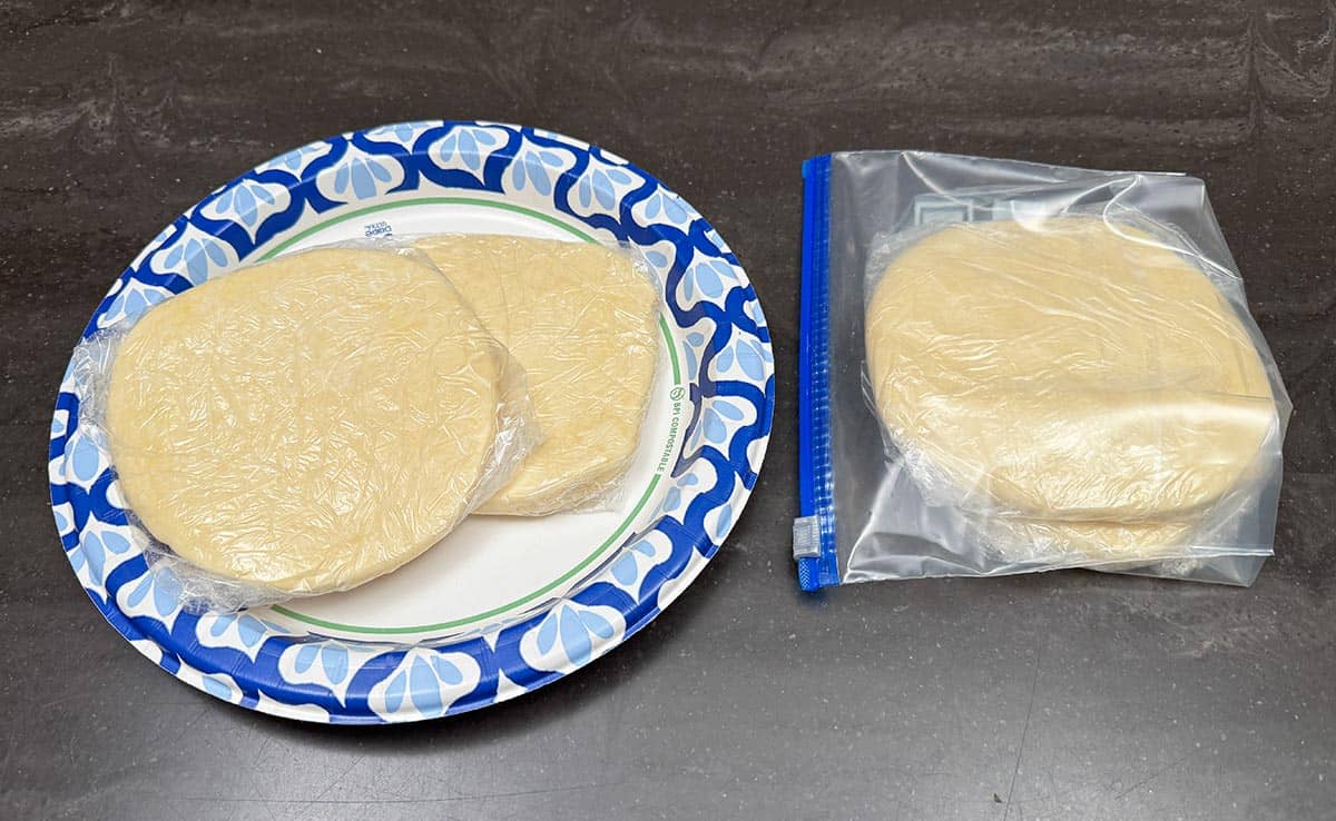 After chilling all four wrapped quarters, two stay in the fridge and the other two go into the freezer.