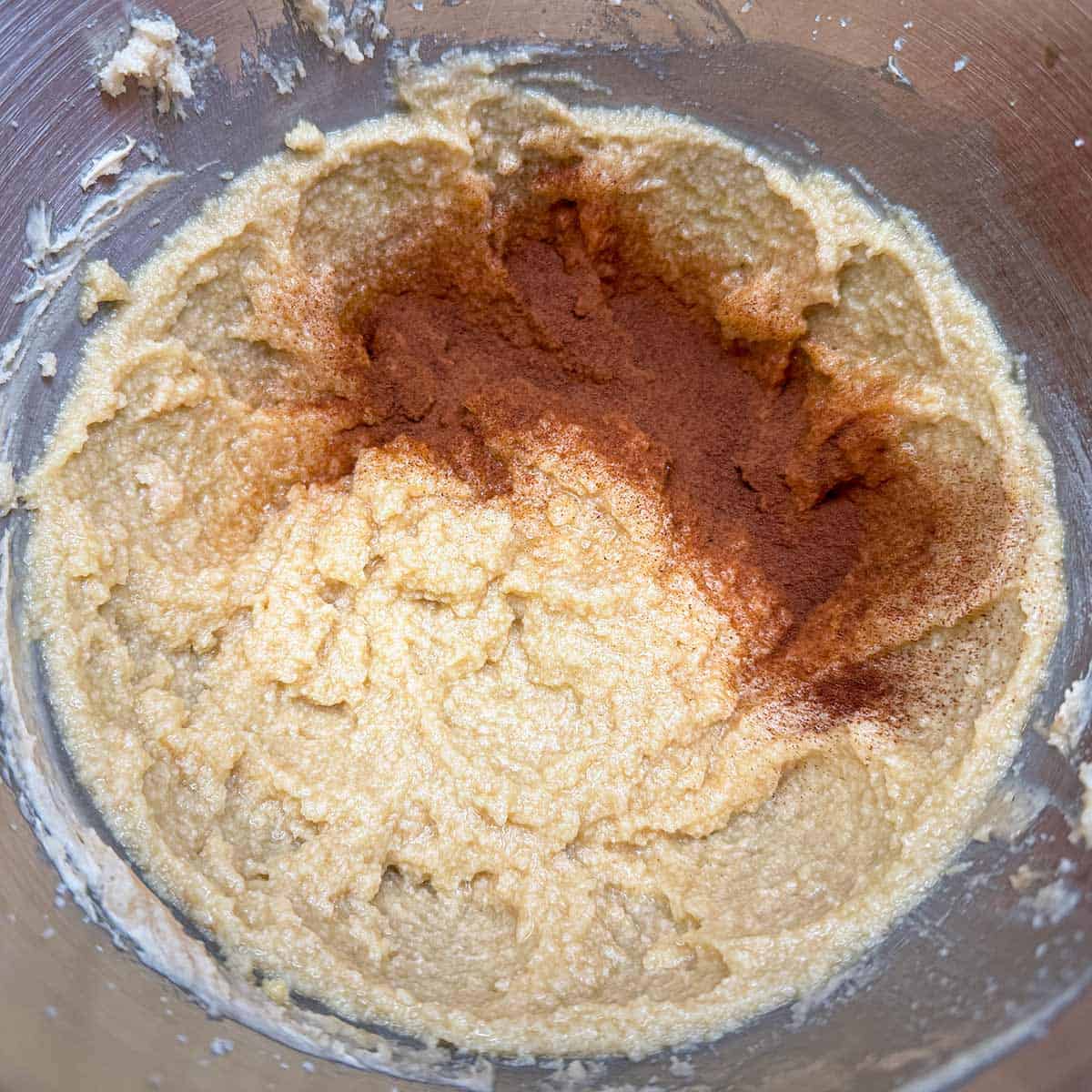 Mixing the espresso coffee with the wet cookie ingredients in a mixer bowl.