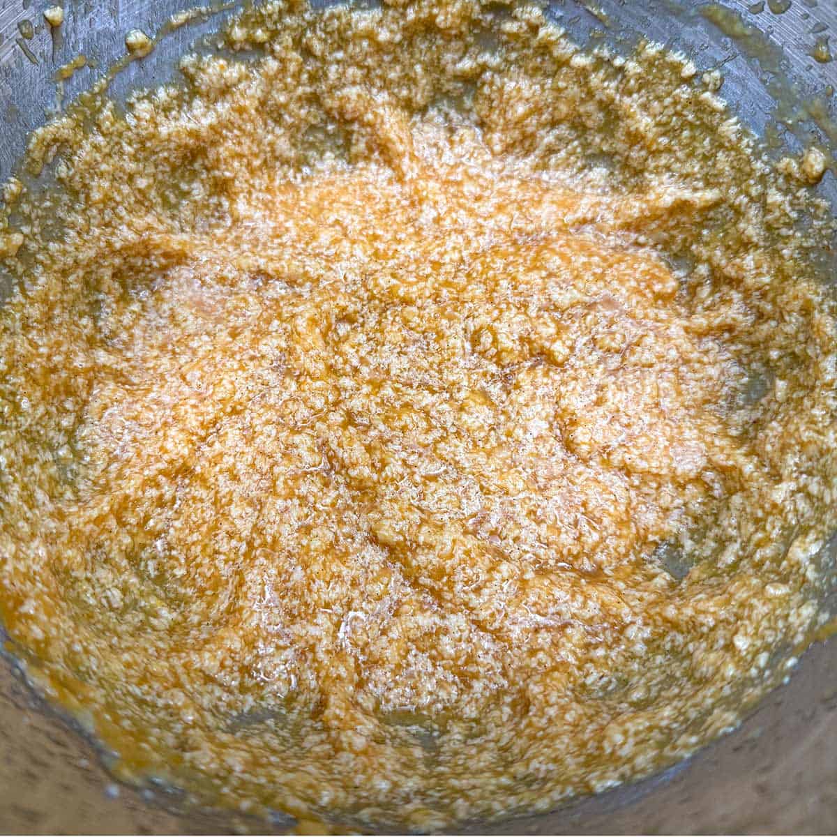 The wet cookie dough looks broken but it is only the applesauce and egg. They will come together after the flour mixture is added.