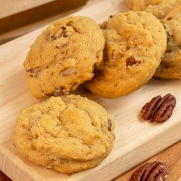 A closeup of a Sweet Potato Pie Cookie on a wooden board.