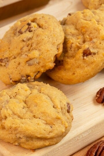 A closeup of a Sweet Potato Pie Cookie on a wooden board.