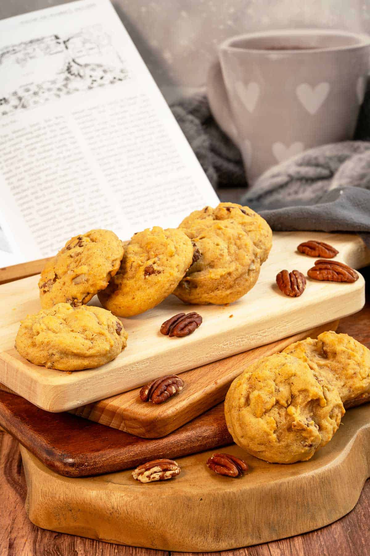A book open and a cup of coffee to go along with the Sweet Potato Pie Cookies.