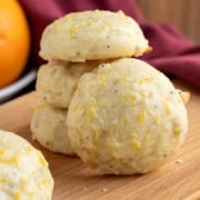 Front and side view of finished Glazed Ricotta Orange Cookies.