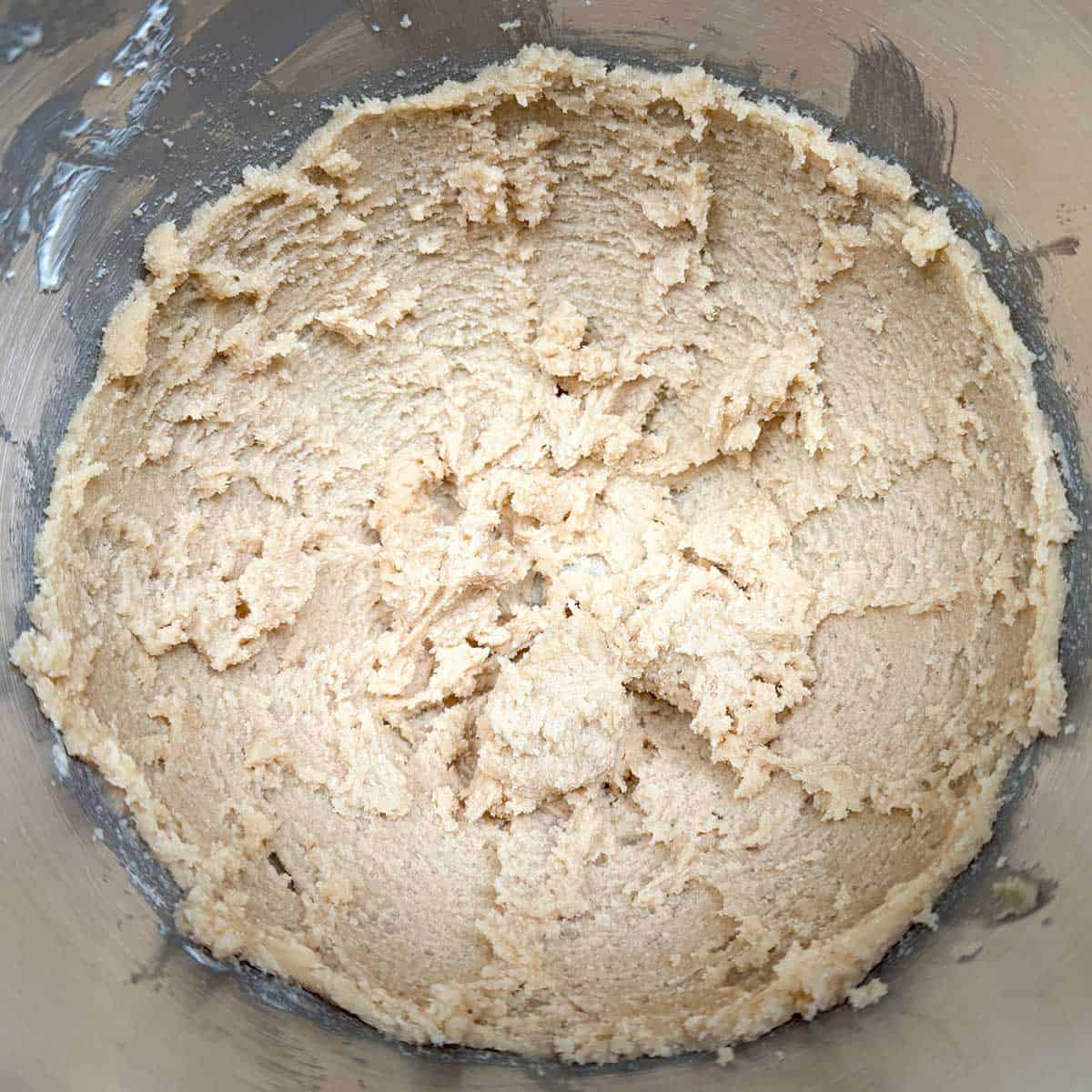 Sugars that have been mixed with the creamed butter. It will be a little grainy.