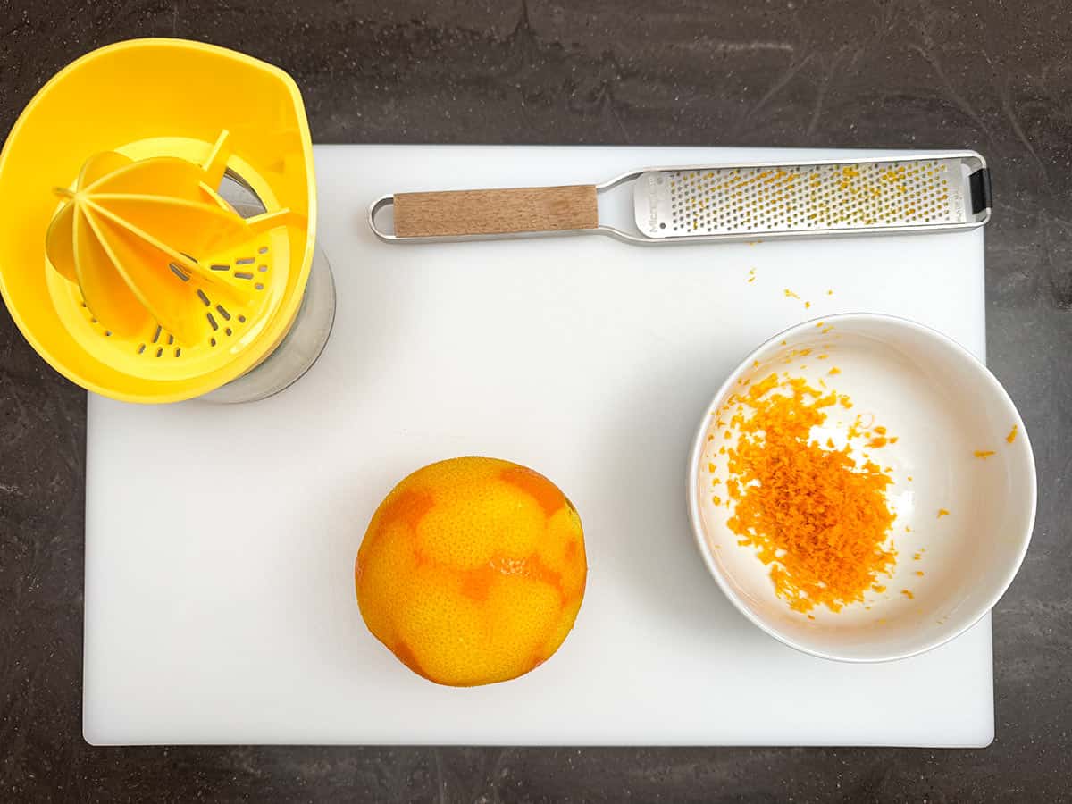 Juicing and zesting a navel orange.