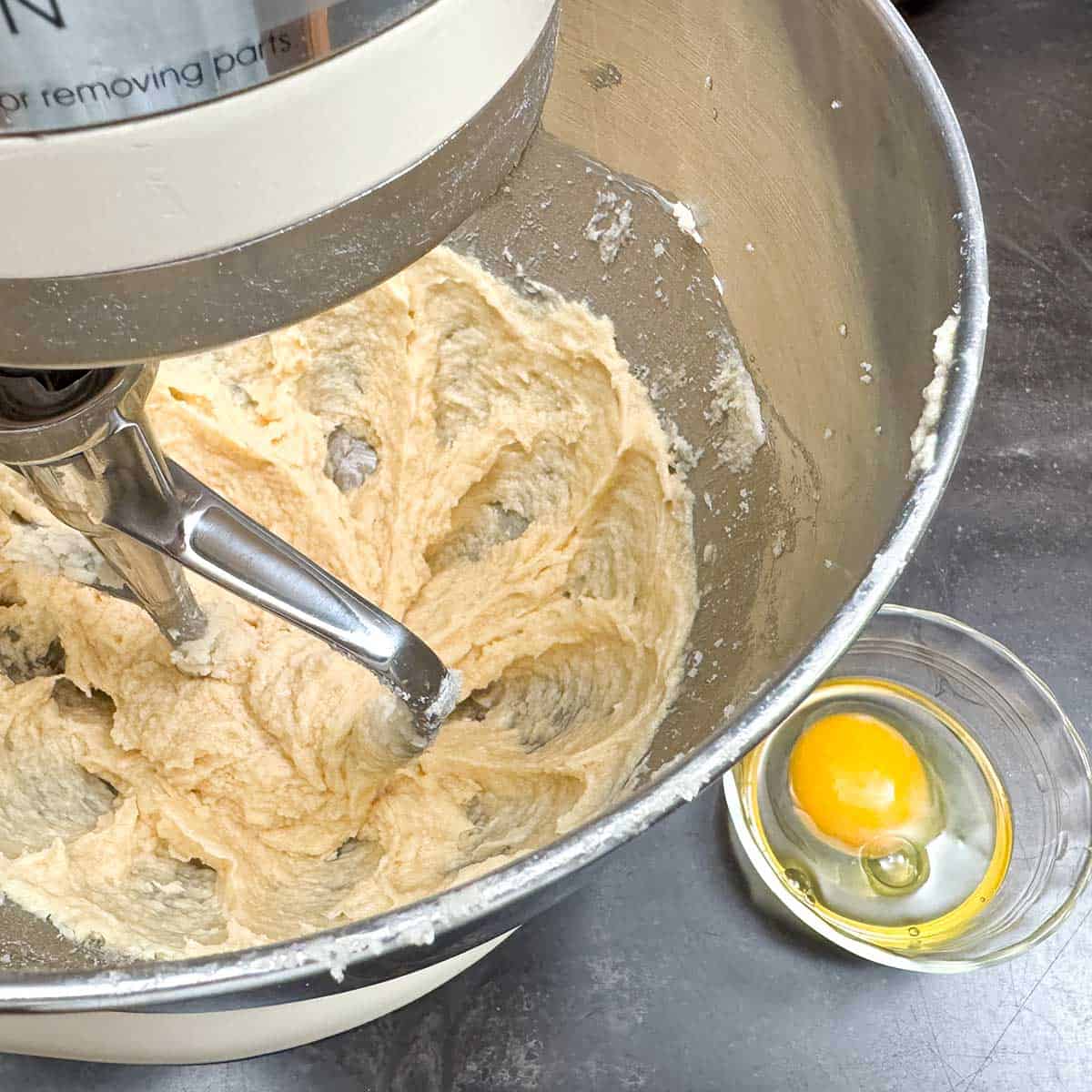Second egg in a small bowl to check for egg shells before adding to the cookie dough to be mixed.