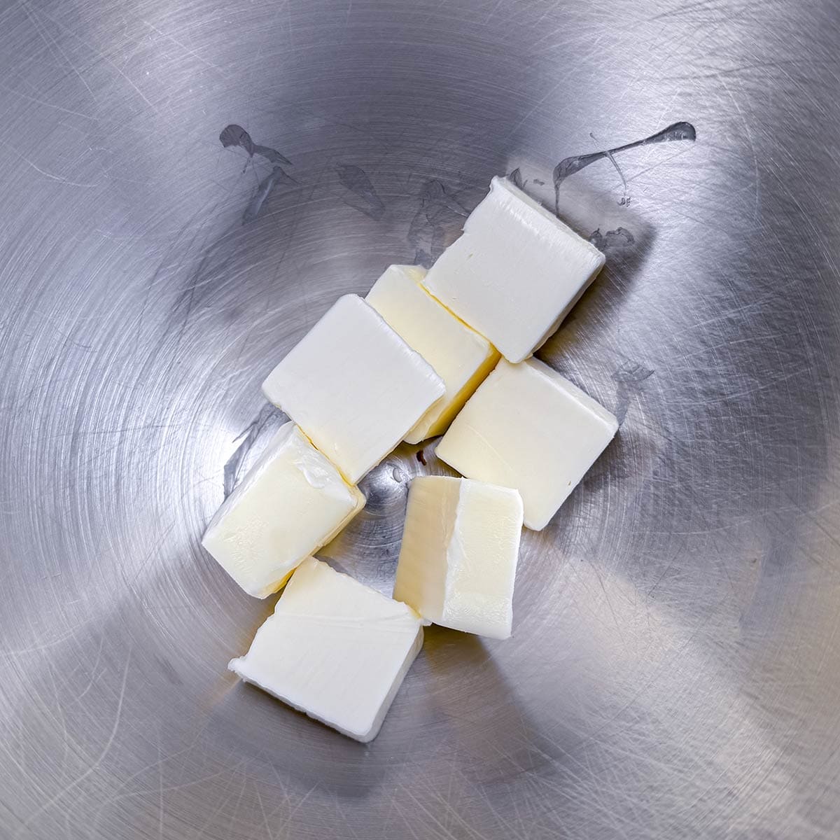 Butter cubed and getting ready to be creamed butter.