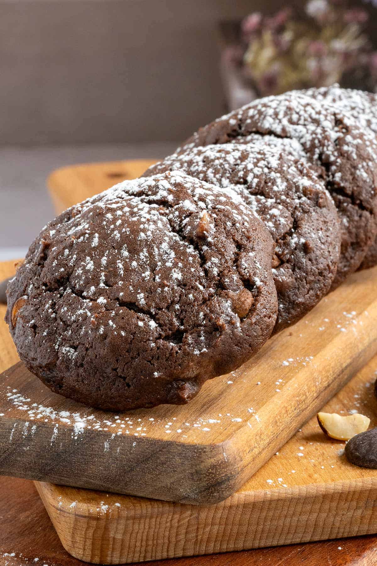 Chocolate hazelnut cookies with espresso on wooden cutting boards.