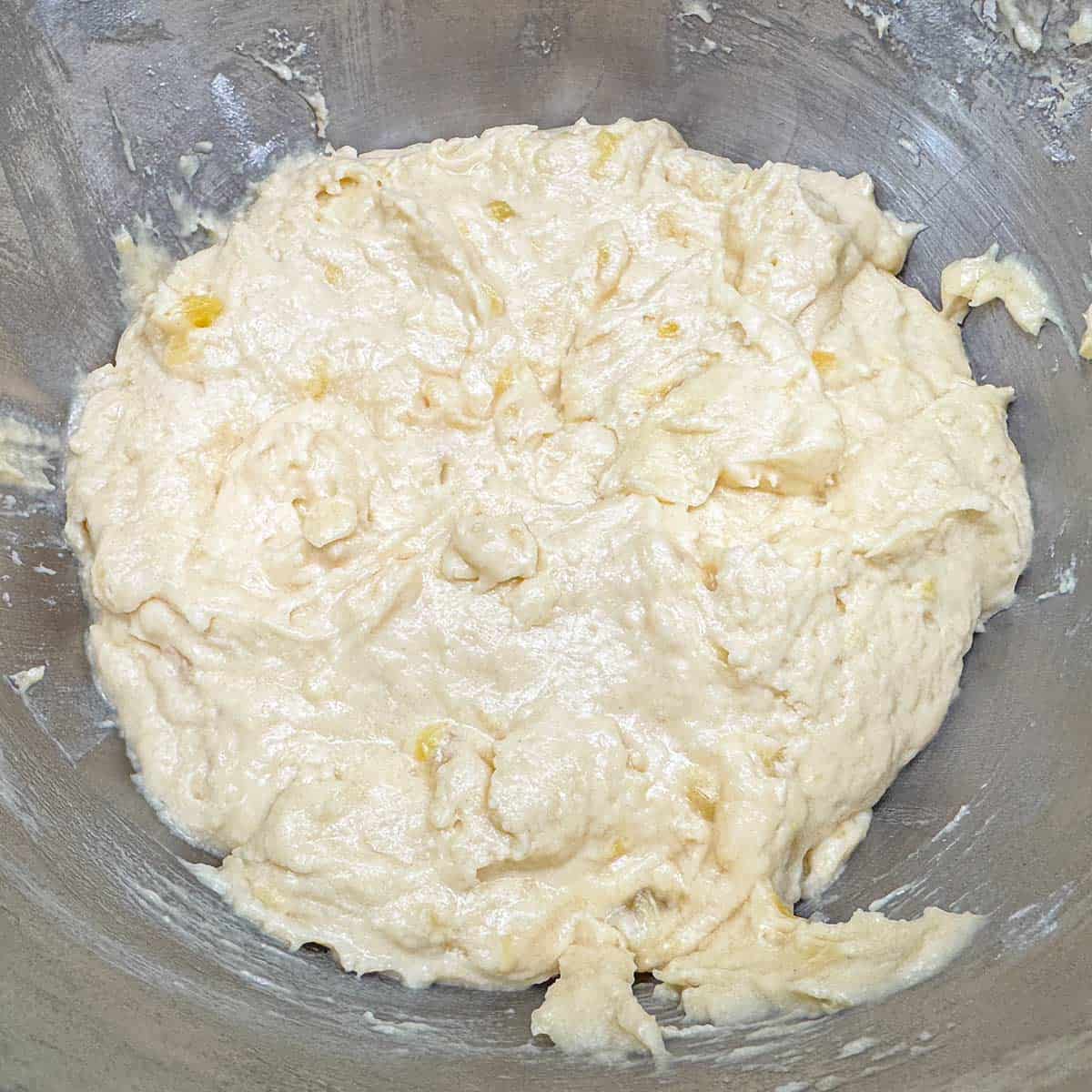 After adding the pineapple pieces and the pineapple juice to the cookie dough.