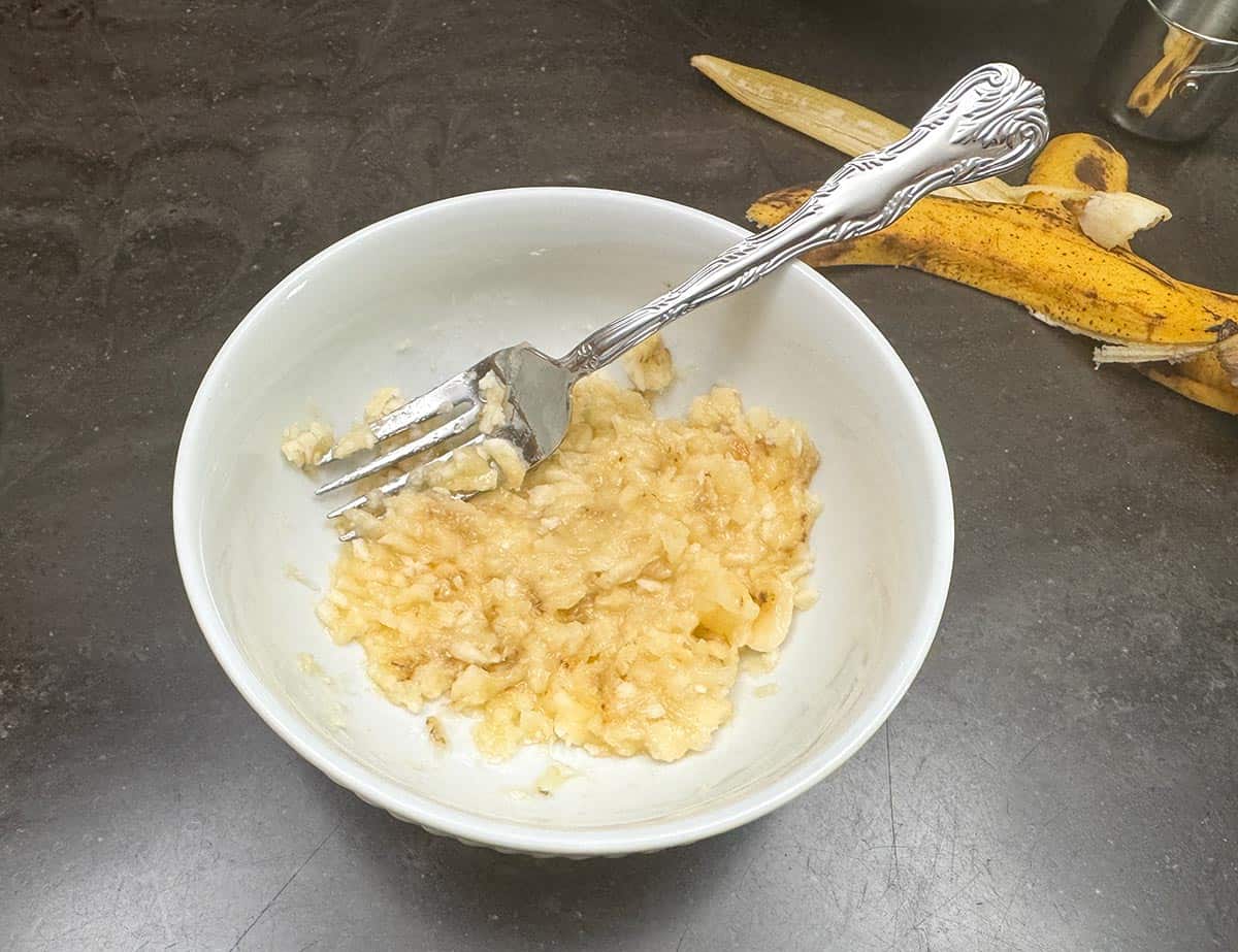 Mushed banana in a bowl.
