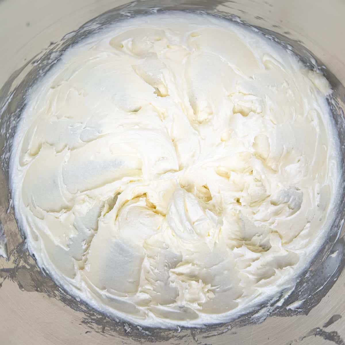 Sugar added to the butter cream cheese mixture.