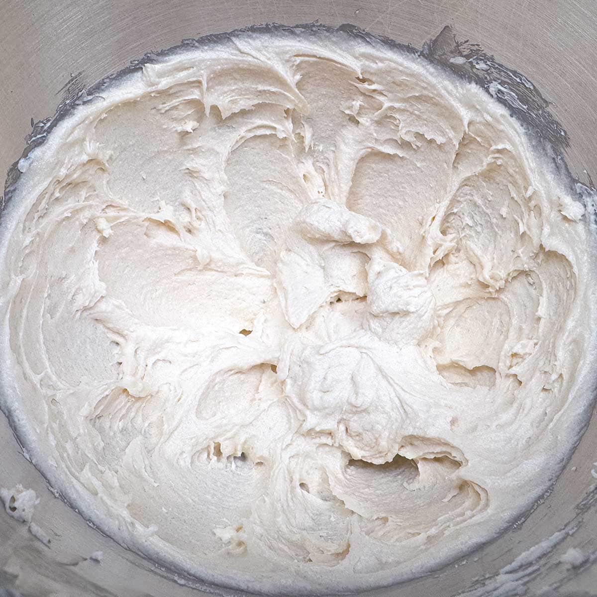 Smooth and creamy after sugars are added to the butter cream cheese mixture.
