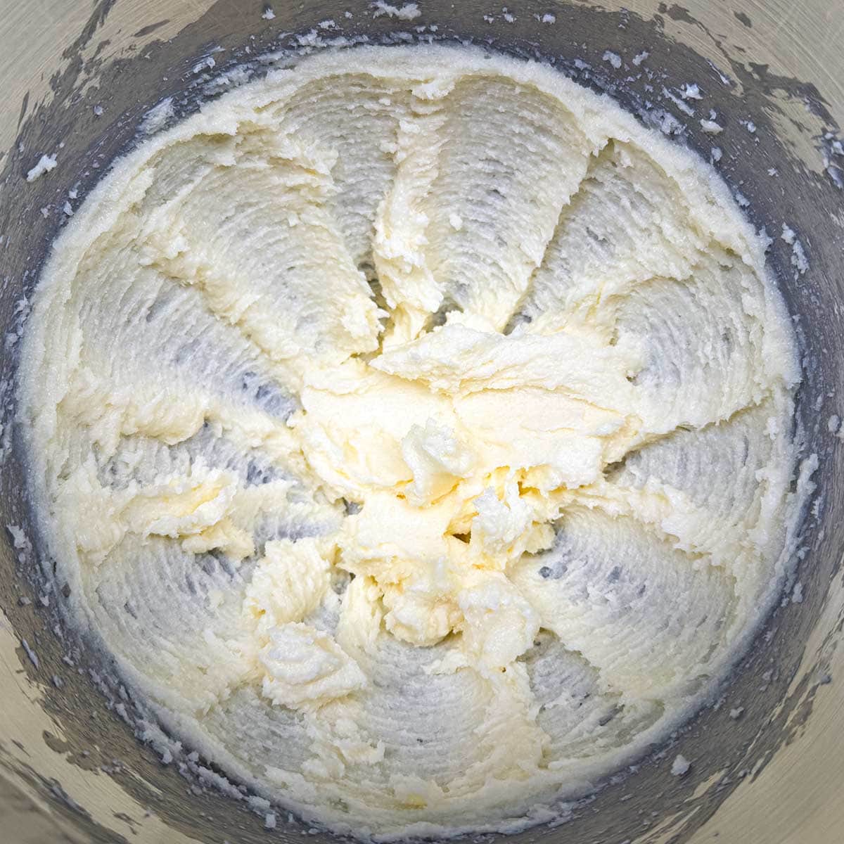 Creamed butter and sugar that is mixed and has a creamy consistency.