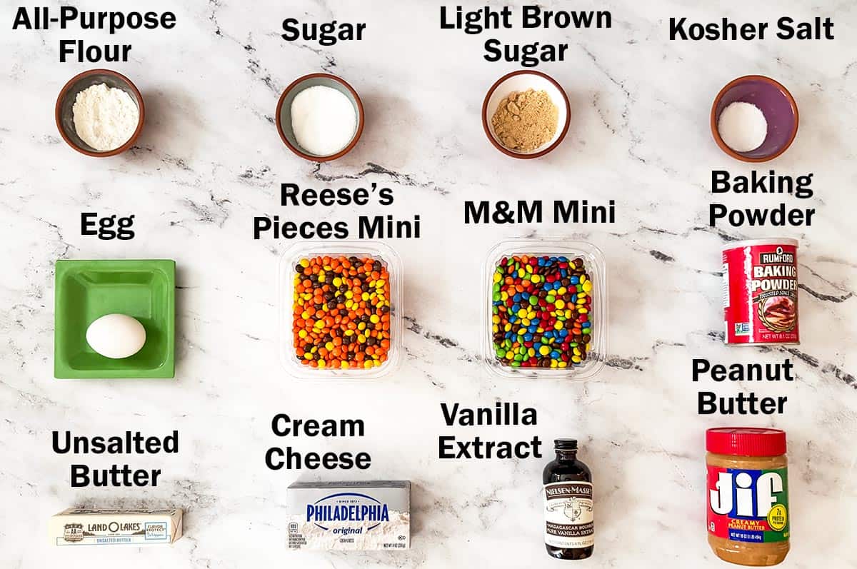 Ingredients to make Peanut Butter M&M and Reese's Pieces Cookies.