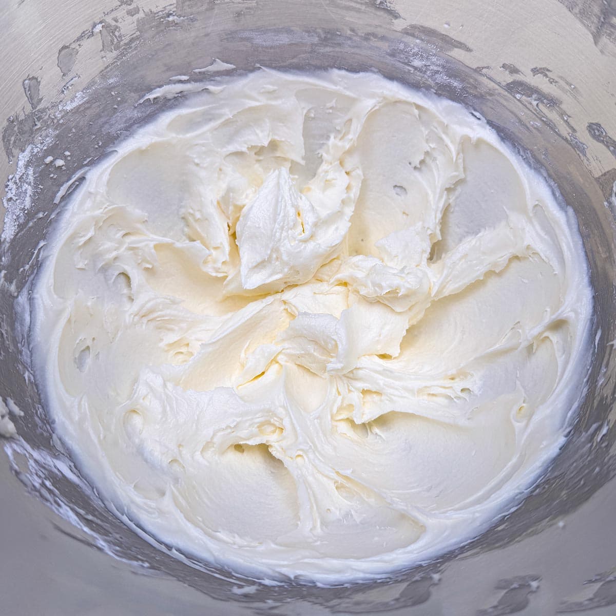 Butter, cream cheese and powdered sugar mixed. Smoothly and creamy looking.