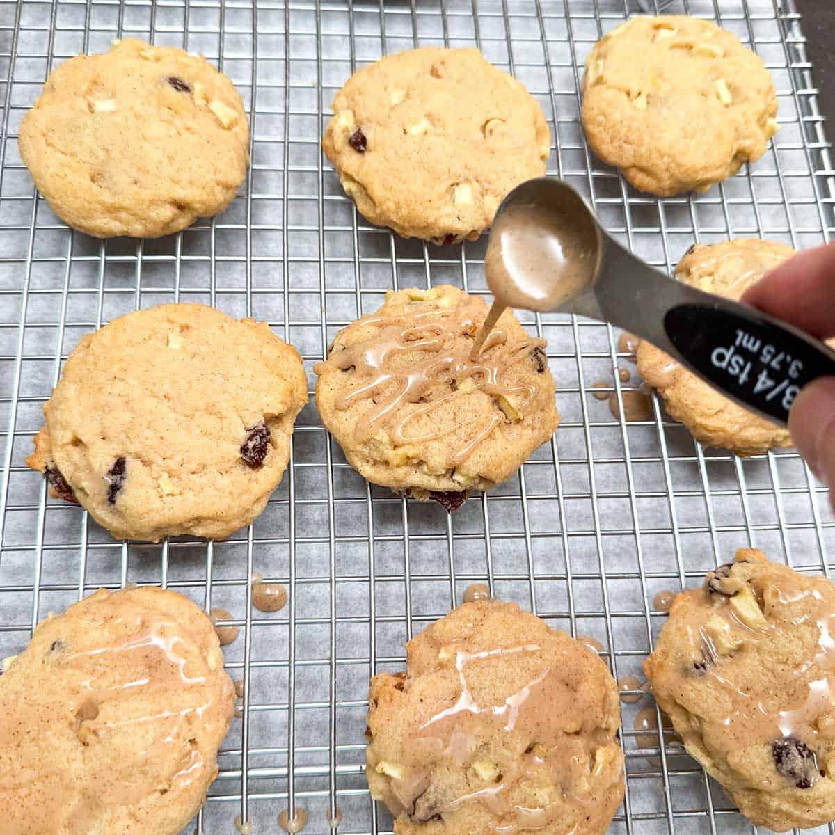 Add the apple cider glaze on top of the Apple Cider Cookies.