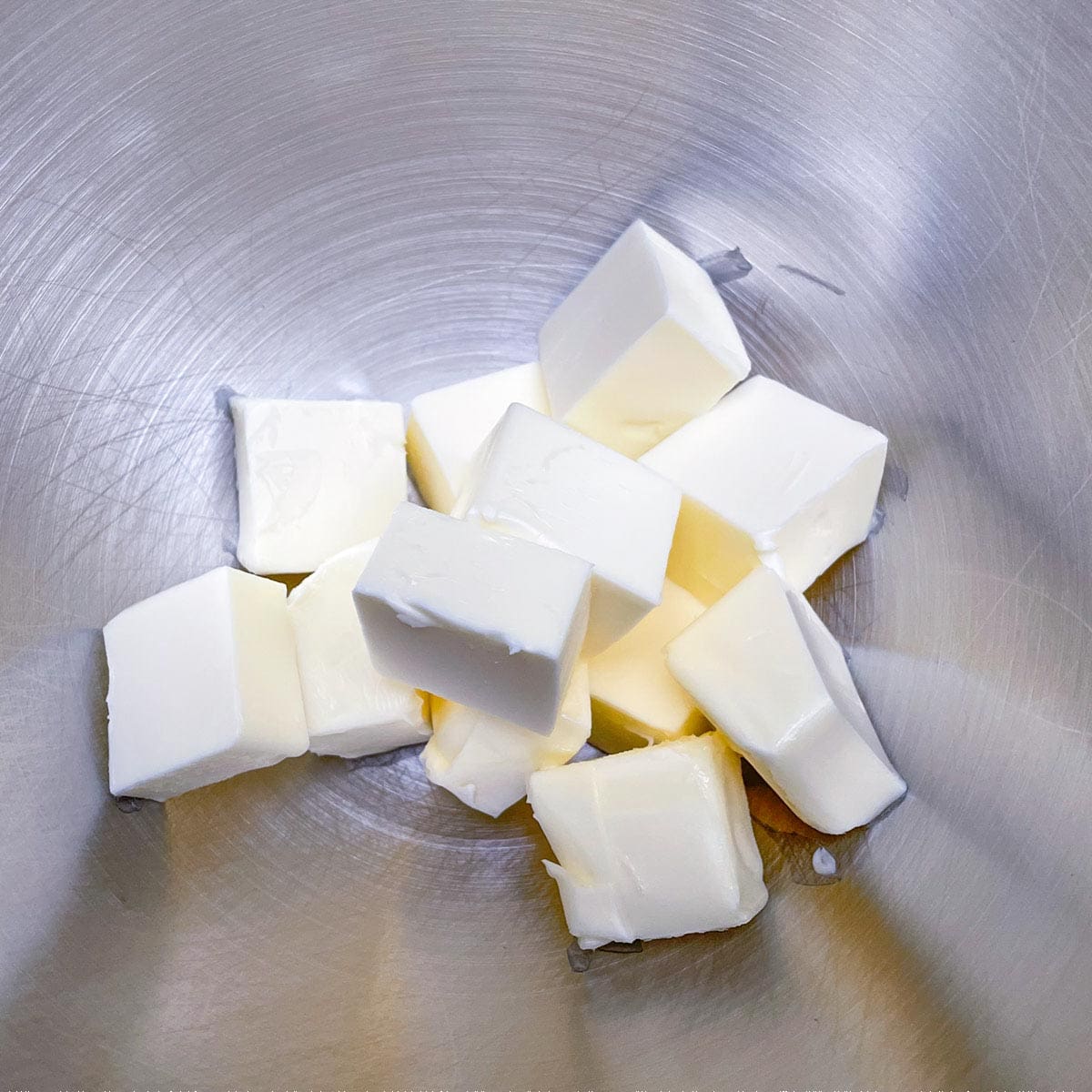 Cubed butter in a mixer bowl for the cookie dough.