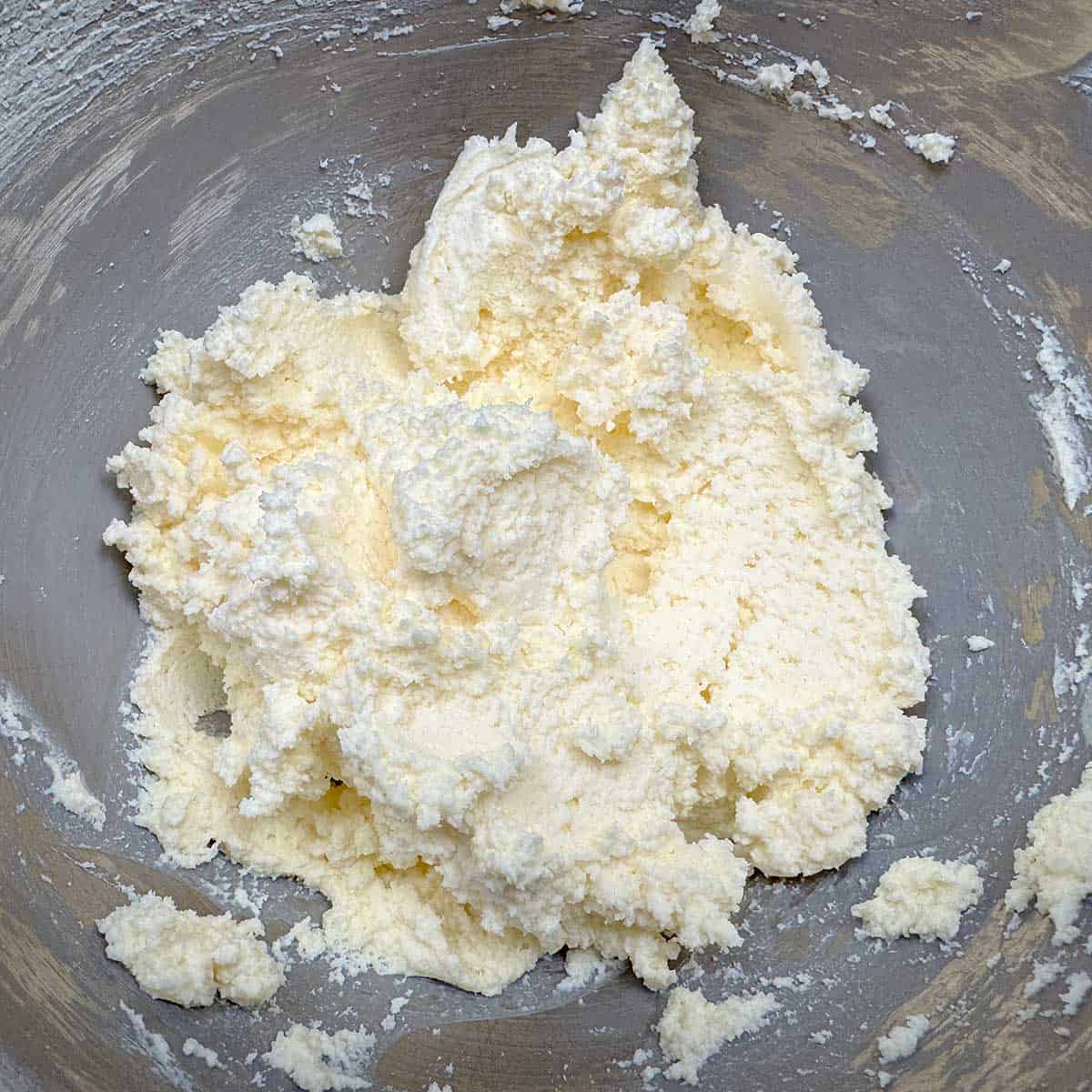 Cream cheese and butter mixed in a mixer bowl for about 1 minute, just to blend together.