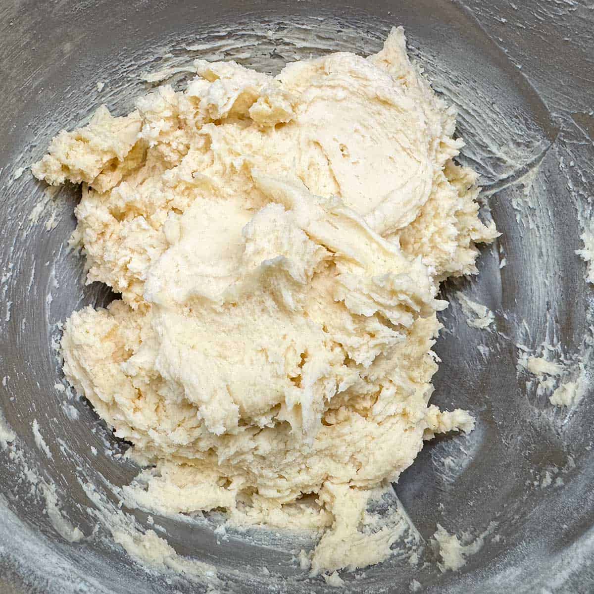 The flour mixture has been added to the wet cookie dough mix and blended.