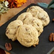Maple butter pecan cookies on a cutting board with 6 cookies - feature.
